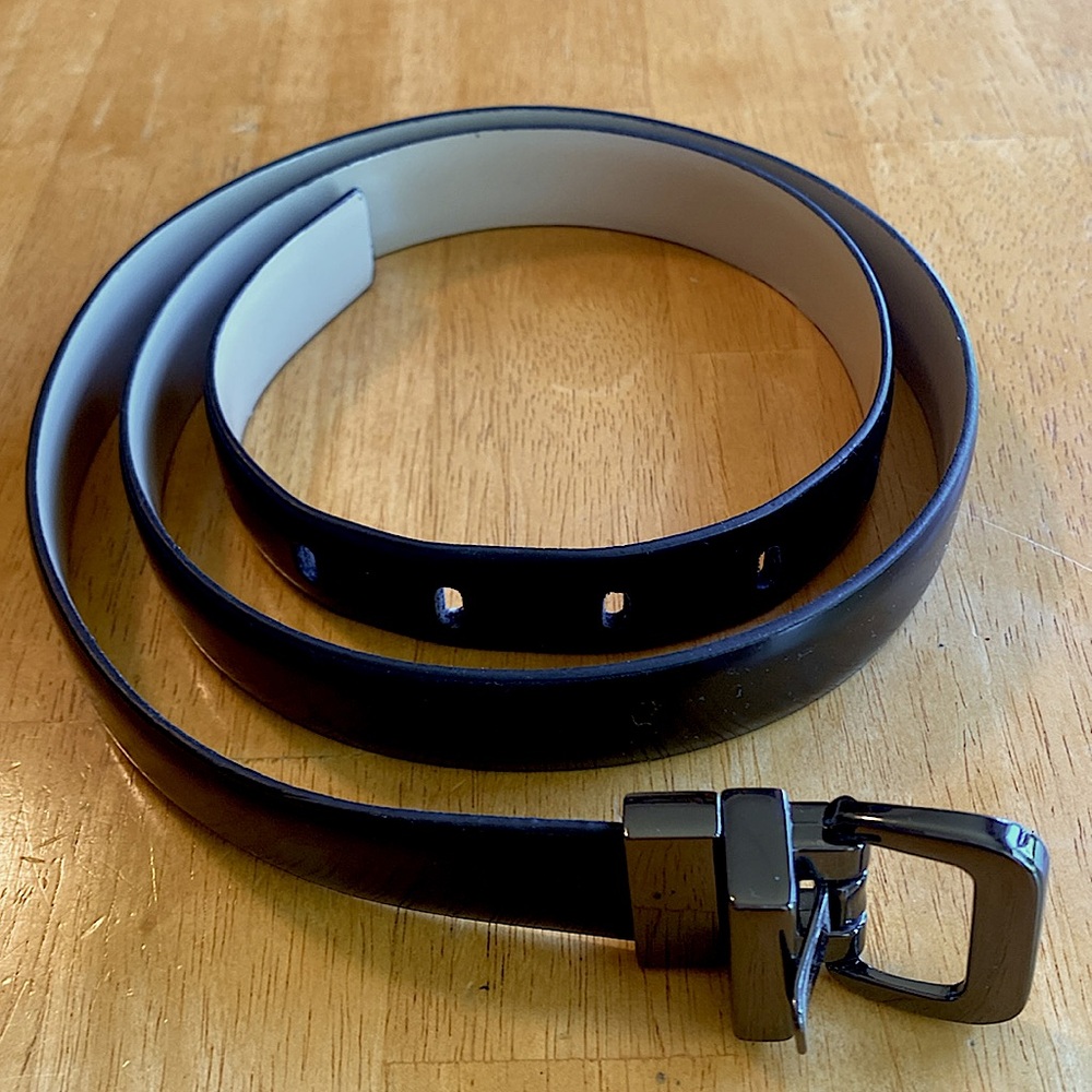 Reversible Belt-Dark Metal Buckle Black and Tan Synthetic Material. 43”